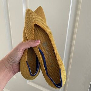 Rothy's Women's Pointed Knit Flats in Mustard Yellow.
